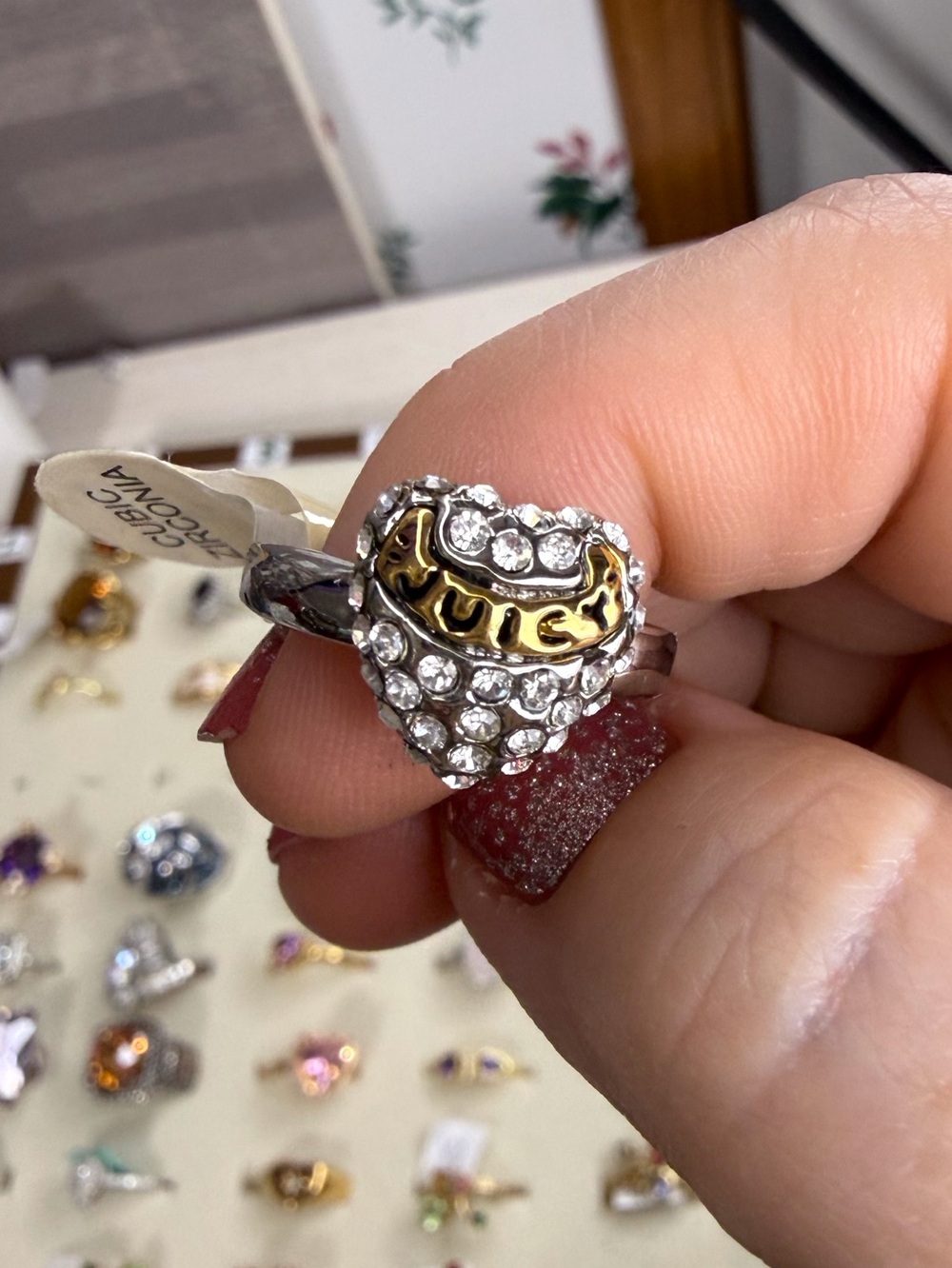 Juicy Couture Silver Tone Heart Ring with Gold Tone Logo and Clear stones